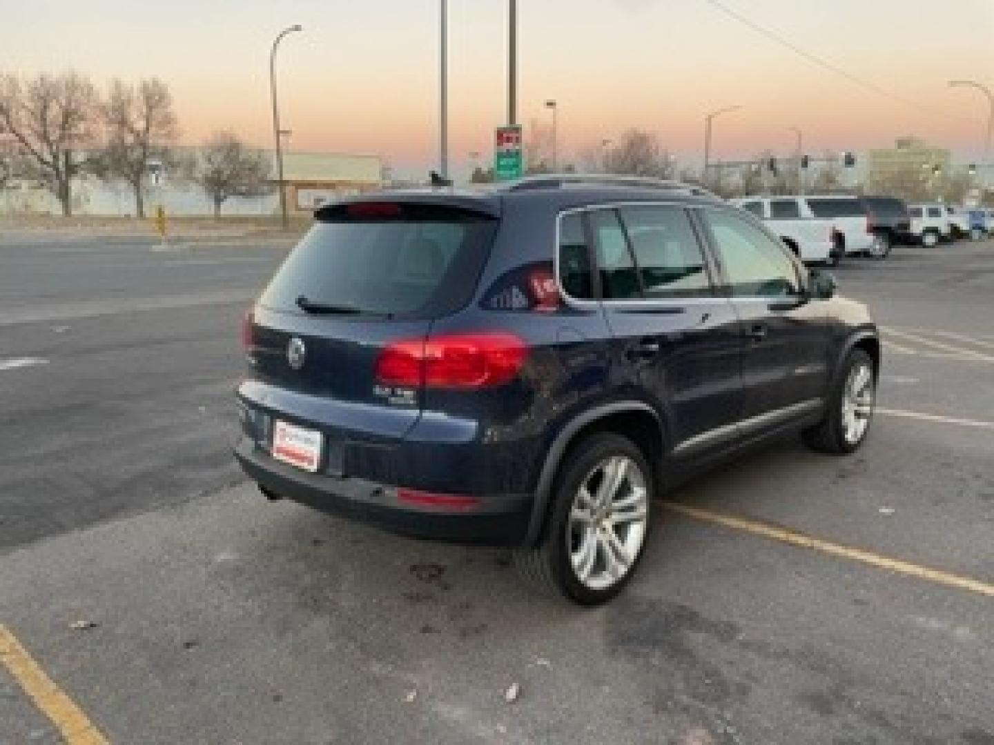 2013 VOLKSWAGEN TIGUAN S (WVGBV3AXXDW) with an 2.0L L4 DOHC 16V TUR engine, located at 10890 W. Colfax Ave., Lakewood, CO, 80215, (303) 274-7692, 39.739914, -105.120132 - Photo#4